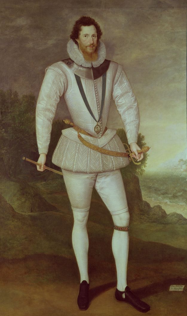 Painting. A pale-skinned man wearing a white suit stands in front of a landscape and looks at us. His brown curls are brushed back from his forehead, and a long ginger beard rests in the pleated ruff around his neck. A gorget, a piece of armour worn around the neck, is over his white jerkin. A sword hangs from a skirt-like, puffed breeches around his hips. His legs are clad in white stockings.